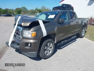 2015 GMC Canyon 2WD SLE with VIN 1GTG5BE31F1166383, listed as a IAAI auction lot 41640378 with 334,016 mi miles. Bid and sale history available at carsss.com. Image 2.