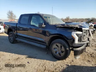 2024 Ford F-150 Lightning XLT with VIN 1FTVW3LK7RWG16730, listed as a Copart auction lot 48976315 with 3,529 mi miles and Salvage title. Bid and sale history available at DreamBid. Image 4.