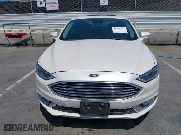 2017 Ford Fusion Titanium with VIN 3FA6P0SU7HR264615, listed as a IAAI auction lot 42747242 with 196,483 mi miles and . Bid and sale history available at DreamBid. Image 13.