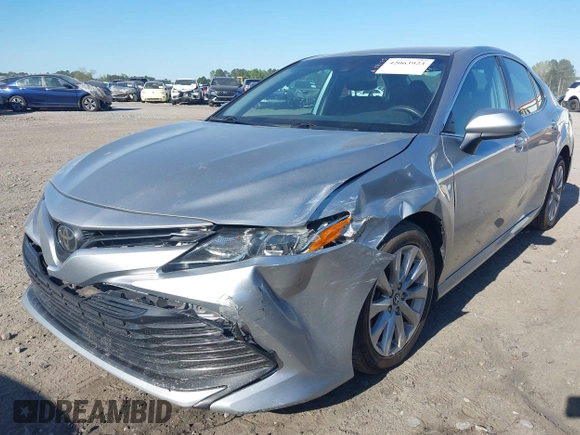 2019 Toyota Camry LE z VIN 4T1B11HK7KU756675, wystawiony jako IAAI lot #42063923 z przebiegiem 132 312 mil mil oraz . Historia ofert i sprzedaży dostępna na DreamBid. Obrazek 6.