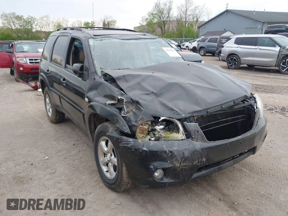 2005 Mazda Tribute S with VIN 4F2YZ96145KM32776, listed as a IAAI auction lot 42159162 with 200,416 mi miles and . Bid and sale history available at DreamBid. Image 1.