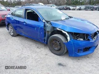 2016 Honda Civic Sedan LX with VIN 19XFC2F51GE233385, listed as a IAAI auction lot 42043765 with 112,253 mi miles. Bid and sale history available at carsss.com. Image 1.