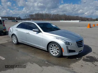 2015 Cadillac CTS RWD with VIN 1G6AP5SX5F0115745, listed as a IAAI auction lot 41658935 with 62,477 mi miles and . Bid and sale history available at DreamBid. Image 1.