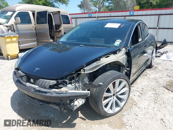 2018 Tesla Model 3 Long Range Battery with VIN 5YJ3E1EAXJF019907, listed as a IAAI auction lot 41995969 with Not Provided miles and . Bid and sale history available at DreamBid. Image 6.