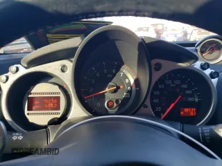 2014 Nissan 370Z Nismo z VIN JN1AZ4EHXEM632166, wystawiony jako Copart lot #88311915 z przebiegiem 18 414 mil mil oraz Szkoda całkowita • Salvage title. Historia ofert i sprzedaży dostępna na DreamBid. Obrazek 9.