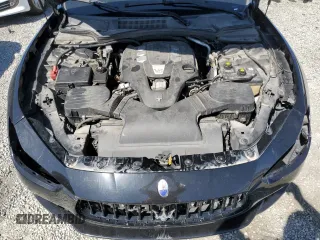 2016 Maserati Ghibli z VIN ZAM57XSA6G1167687, wystawiony jako Copart lot #51443315 z przebiegiem Nie podano mil oraz Szkody całkowita. Historia ofert i sprzedaży dostępna na DreamBid. Obrazek 11.