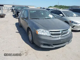 2013 Dodge Avenger SXT with VIN 1C3CDZCB8DN562180, listed as a IAAI auction lot 42000811 with 207,872 mi miles and . Bid and sale history available at carsss.com. Image 1.