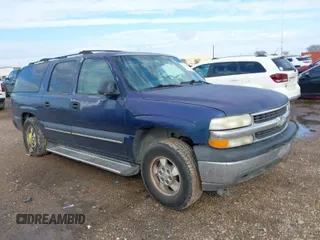 2003 Chevrolet Suburban LT with VIN 1GNEC16Z03J229017, listed as a IAAI auction lot 41241410 with 250,718 mi miles. Bid and sale history available at carsss.com. Image 1.