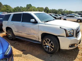2015 GMC Yukon SLT with VIN 1GKS2BKC1FR736203, listed as a Copart auction lot 67977694 with 178,781 mi miles and Salvage Title. Bid and sale history available at carsss.com. Image 4.