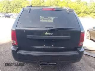 2005 Jeep Grand Cherokee Laredo z VIN 1J4GR48K65C725099, wystawiony jako IAAI lot #42509223 z przebiegiem 249 216 mil mil oraz . Historia ofert i sprzedaży dostępna na DreamBid. Obrazek 17.
