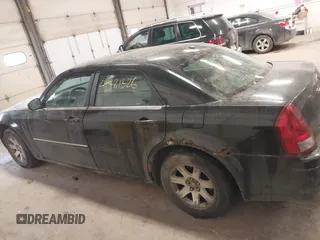 2007 Chrysler 300 with VIN 2C3LA43R17H860639, listed as a IAAI auction lot 41481326 with 163,837 mi miles. Bid and sale history available at carsss.com. Image 14.
