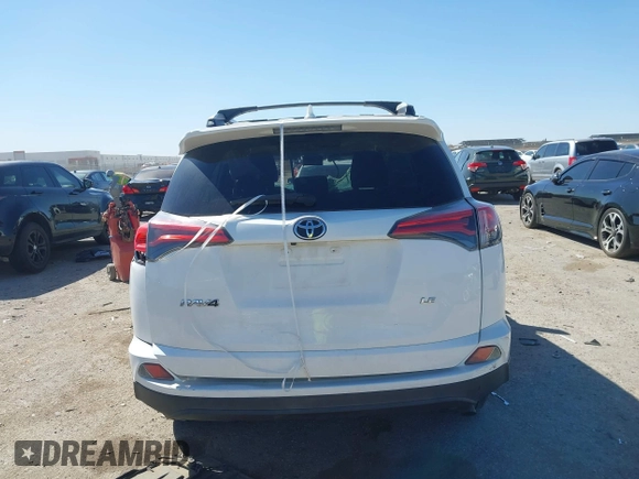 2016 Toyota RAV4 LE with VIN 2T3ZFREV2GW291072, listed as a IAAI auction lot 41831444 with 135,820 mi miles. Bid and sale history available at carsss.com. Image 16.
