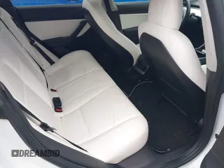2018 Tesla Model 3 Long Range Battery z VIN 5YJ3E1EB8JF135728, wystawiony jako IAAI lot #41863870 z przebiegiem 124 053 mil mil oraz . Historia ofert i sprzedaży dostępna na DreamBid. Obrazek 8.