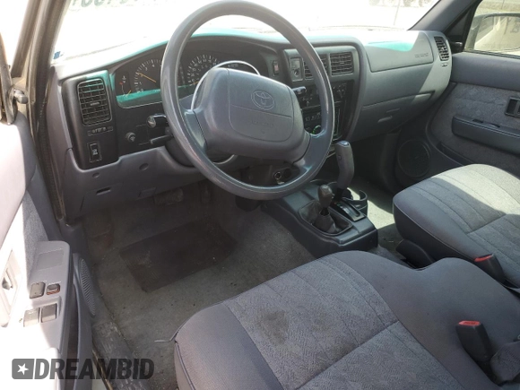 2000 Toyota Tacoma with VIN 5TEWN72N8YZ717707, listed as a Copart auction lot 54479455 with 197,407 mi miles and Salvage title. Bid and sale history available at DreamBid. Image 8.