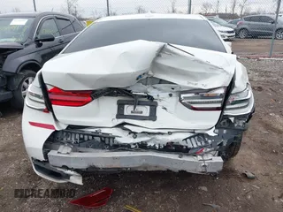 2016 BMW 7 Series 740i with VIN WBA7E2C50GG714647, listed as a IAAI auction lot 41745442 with 134,399 mi miles and . Bid and sale history available at carsss.com. Image 17.