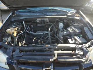 2005 Mazda Tribute i with VIN 4F2YZ02Z75KM57730, listed as a Copart auction lot 82480024 with 188,236 mi miles and Salvage Title. Bid and sale history available at carsss.com. Image 11.