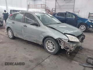 2005 Ford Focus S with VIN 3FAHP37N45R107938, listed as a IAAI auction lot 41612176 with 155,173 mi miles and . Bid and sale history available at carsss.com. Image 1.