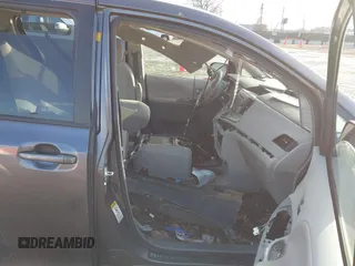 2012 Toyota Sienna SE with VIN 5TDXK3DC5CS264461, listed as a IAAI auction lot 41526874 with 1 mi miles. Bid and sale history available at carsss.com. Image 5.