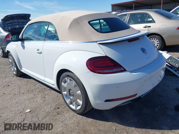 2018 Volkswagen Beetle S with VIN 3VW5DAAT1JM506988, listed as a IAAI auction lot 41589324 with 50,873 mi miles and . Bid and sale history available at DreamBid. Image 3.