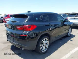 2018 BMW X2 sDrive28i with VIN WBXYJ3C35JEJ82700, listed as a IAAI auction lot 42675146 with 84,961 mi miles and . Bid and sale history available at DreamBid. Image 4.