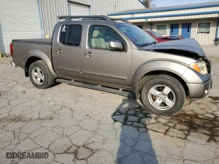 2005 Nissan Frontier 4WD LE with VIN 1N6AD07W65C436812, listed as a Copart auction lot 77156274 with 173,903 mi miles and Salvage Title. Bid and sale history available at carsss.com. Image 4.