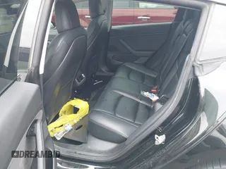 2020 Tesla Model 3 Long Range z VIN 5YJ3E1EB8LF790197, wystawiony jako IAAI lot #42053433 z przebiegiem 73 006 mil mil oraz . Historia ofert i sprzedaży dostępna na DreamBid. Obrazek 8.