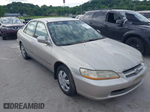 1999 Honda Accord LX with VIN JHMCG5642XC003361, listed as a IAAI auction lot 42270009 with 160,706 mi miles and . Bid and sale history available at DreamBid. Image 1.