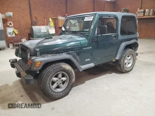 2000 Jeep Wrangler SE with VIN 1J4FA29P8YP783102, listed as a Copart auction lot 53730105 with 233,635 mi miles and Salvage title. Bid and sale history available at DreamBid. Image 1.