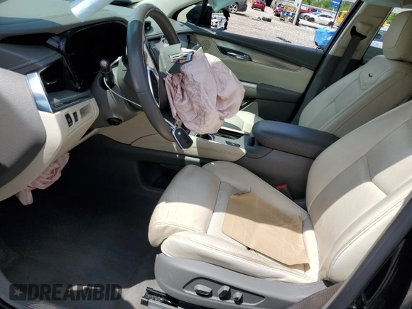 2017 Cadillac XT5 Luxury FWD с VIN 1GYKNBRS0HZ150007, выставлен на аукционе Copart как лот 54745505 с пробегом 37 271 миль миль и Списание • Salvage title. История ставок и продаж доступна на DreamBid. Изображение 7.
