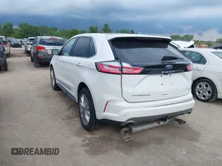 2021 Ford Edge Titanium with VIN 2FMPK4K96MBA18546, listed as a IAAI auction lot 42584326 with 65,214 mi miles and . Bid and sale history available at DreamBid. Image 3.