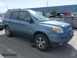 2008 Honda Pilot EX-L with VIN 5FNYF18798B025615, listed as a IAAI auction lot 38909579 with 121,128 mi miles. Bid and sale history available at carsss.com. Image 1.
