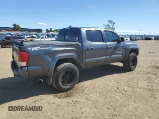 2017 Toyota Tacoma SR5 with VIN 3TMAZ5CNXHM032218, listed as a Copart auction lot 49672275 with 104,244 mi miles and Salvage Title. Bid and sale history available at DreamBid. Image 3.