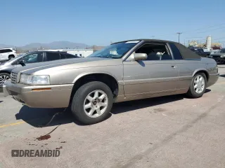 2002 Cadillac Eldorado Touring ETC z VIN 1G6ET12952B101866, wystawiony jako Copart lot #57365965 z przebiegiem Nie podano mil oraz Tytuł czysty. Historia ofert i sprzedaży dostępna na DreamBid. Obrazek 1.