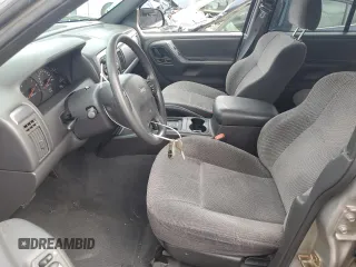 2001 Jeep Grand Cherokee Laredo with VIN 1J4GW48S91C580921, listed as a Copart auction lot 59005625 with 163,827 mi miles and Salvage title. Bid and sale history available at DreamBid. Image 7.