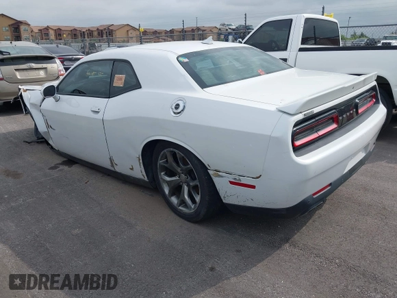 2015 Dodge Challenger SXT Plus with VIN 2C3CDZBG8FH906356, listed as a IAAI auction lot 42396865 with 184,565 mi miles and . Bid and sale history available at DreamBid. Image 3.
