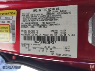2014 Ford Fusion Titanium Hybrid with VIN 3FA6P0RUXER289087, listed as a IAAI auction lot 41418491 with 126,849 mi miles. Bid and sale history available at carsss.com. Image 9.