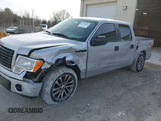 2014 Ford F-150 XL with VIN 1FTFW1CF9EKD01358, listed as a IAAI auction lot 41618800 with 220,888 mi miles. Bid and sale history available at carsss.com. Image 6.