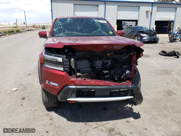 2023 Nissan Frontier PRO-4X with VIN 1N6ED1EK2PN618618, listed as a Copart auction lot 57197604 with 25,362 mi miles and Salvage Title. Bid and sale history available at carsss.com. Image 5.