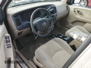 2001 Mazda Tribute LX with VIN 4F2CU081X1KM70119, listed as a Copart auction lot 89311935 with 176,851 mi miles and Salvage Title. Bid and sale history available at DreamBid. Image 8.
