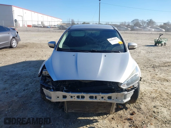 2016 Ford Focus SE with VIN 1FADP3F27GL390830, listed as a IAAI auction lot 41665012 with 119,673 mi miles. Bid and sale history available at carsss.com. Image 12.