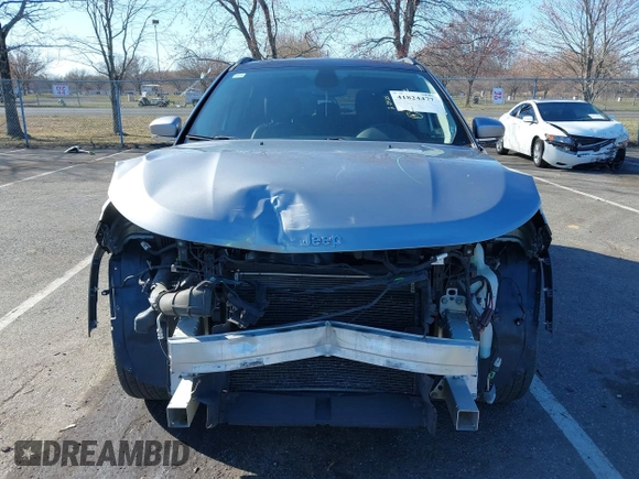 2018 Jeep Compass Limited with VIN 3C4NJCCB6JT489123, listed as a IAAI auction lot 41824477 with 101,291 mi miles and . Bid and sale history available at DreamBid. Image 12.