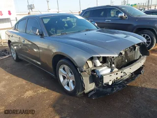2012 Dodge Charger SE with VIN 2C3CDXBG2CH297166, listed as a IAAI auction lot 41992613 with 136,755 mi miles. Bid and sale history available at carsss.com. Image 1.
