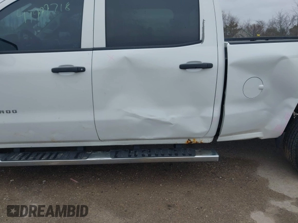 2014 Chevrolet Silverado 1500 LT with VIN 3GCUKREC6EG194197, listed as a IAAI auction lot 41999718 with 206,916 mi miles and . Bid and sale history available at DreamBid. Image 18.