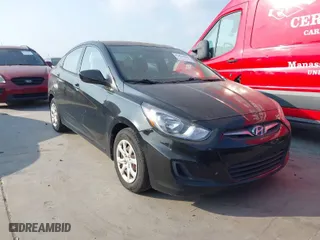 2014 Hyundai Accent GLS with VIN KMHCT4AE1EU736169, listed as a IAAI auction lot 42068599 with 100,423 mi miles. Bid and sale history available at carsss.com. Image 1.