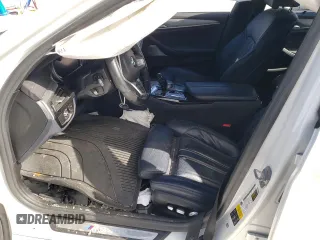 2018 BMW 5 Series M550i xDrive с VIN WBAJB9C59JB050103, выставлен на аукционе Copart как лот 44687215 с пробегом Не указан миль и Списание • Salvage title. История ставок и продаж доступна на DreamBid. Изображение 7.