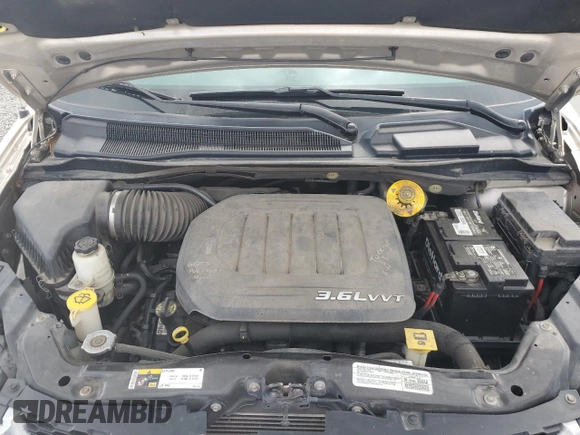 2014 Dodge Grand Caravan SXT 30th Anniversary with VIN 2C4RDGCG2ER328126, listed as a Copart auction lot 74277684 with Not Provided miles and Salvage Title. Bid and sale history available at DreamBid. Image 12.