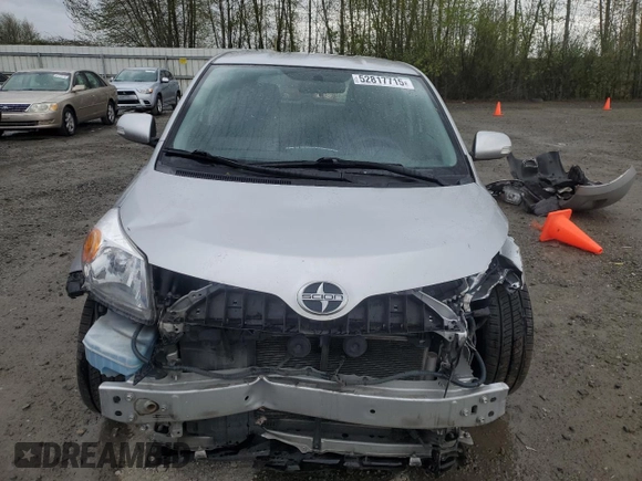 2011 Scion xD with VIN JTKKU4B44B1014235, listed as a Copart auction lot 52817715 with 96,941 mi miles and Salvage Title. Bid and sale history available at carsss.com. Image 5.