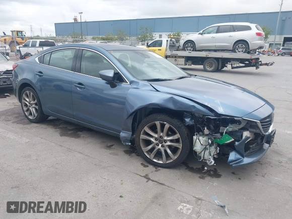 2014 Mazda 6 i Grand Touring with VIN JM1GJ1W64E1133729, listed as a IAAI auction lot 42050222 with 112,464 mi miles and . Bid and sale history available at DreamBid. Image 1.
