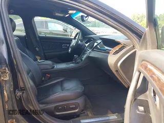 2014 Ford Taurus Limited with VIN 1FAHP2F86EG163392, listed as a IAAI auction lot 42538336 with 131,910 mi miles and . Bid and sale history available at DreamBid. Image 5.