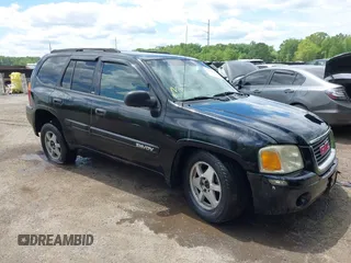 2003 GMC Envoy SLE z VIN 1GKDT13S632149005, wystawiony jako IAAI lot #42209526 z przebiegiem 299 784 mil mil oraz . Historia ofert i sprzedaży dostępna na DreamBid. Obrazek 1.